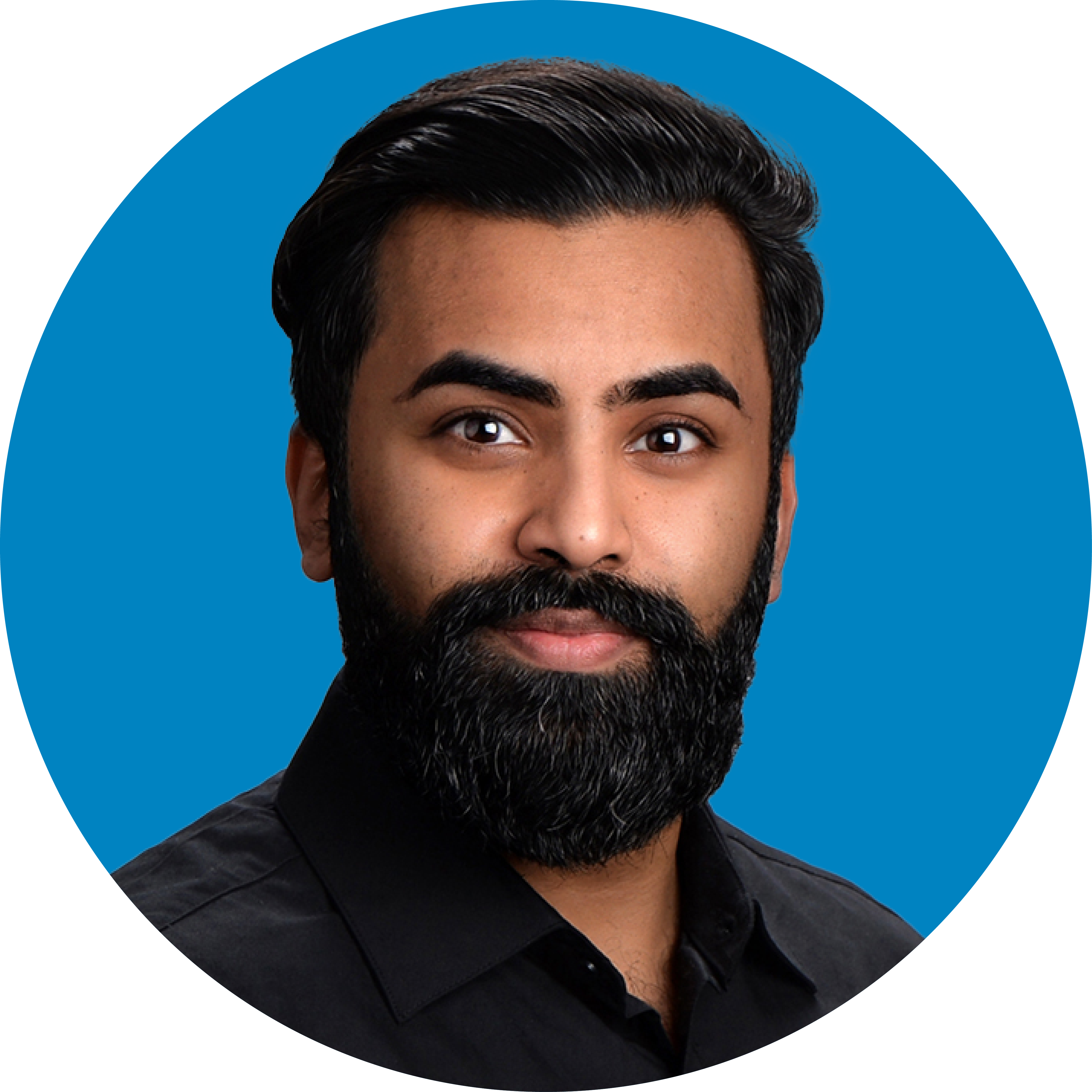 Mishal Makshood headshot blue background